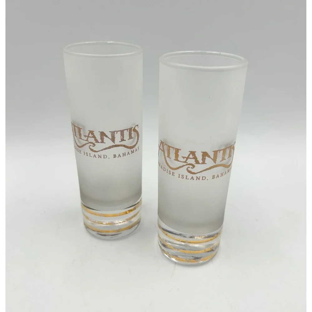 Atlantis Pair of Tall Shot Glasses Frosted Gold Bahamas Souvenir EUC Set of 2